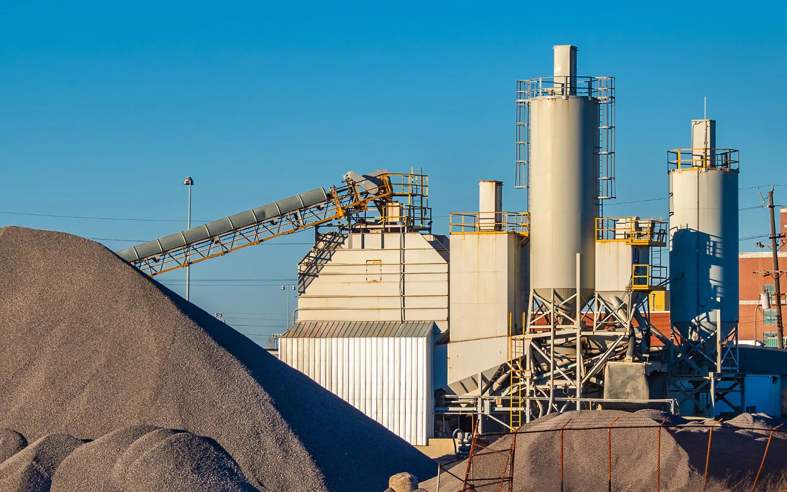 Cement plant tanks, kiln and preheater on the running line
