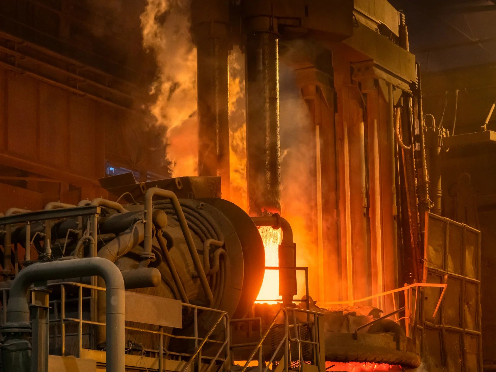 Float glass furnace operator reviewing combustion and temperature trends
