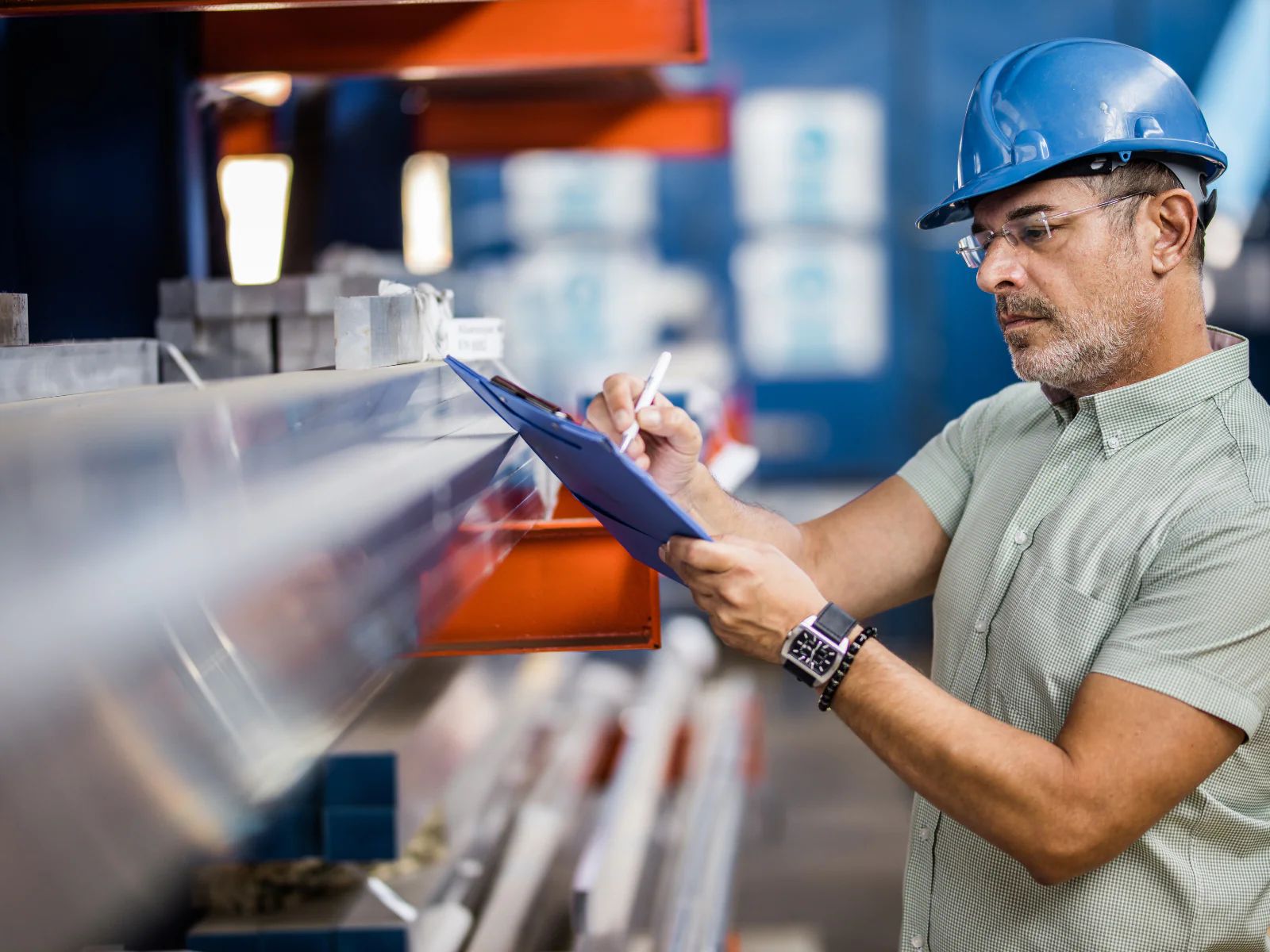 Steel production team reviewing yield-loss predictions and process data