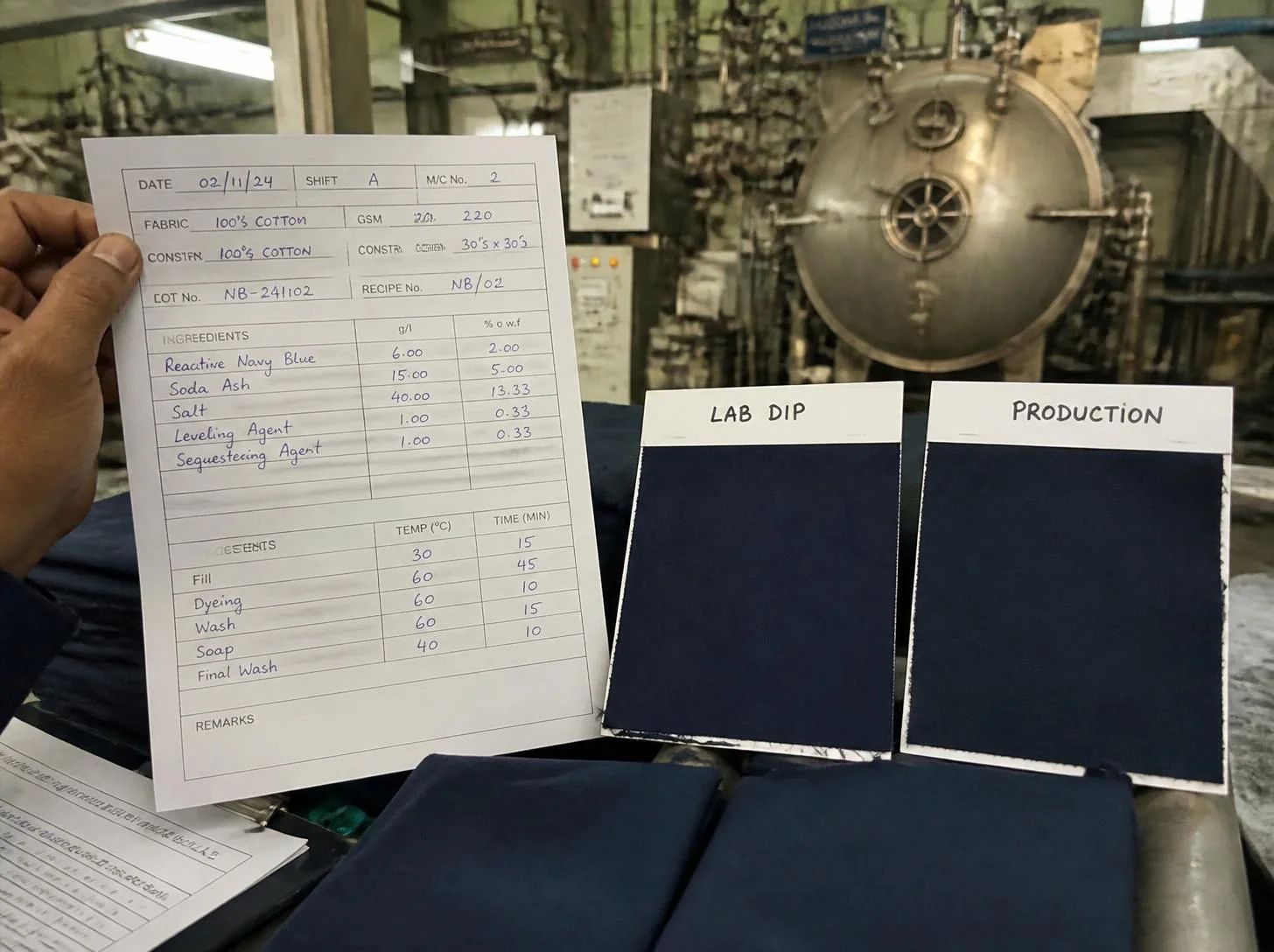 Textile lab technician measuring dyed fabric color strength