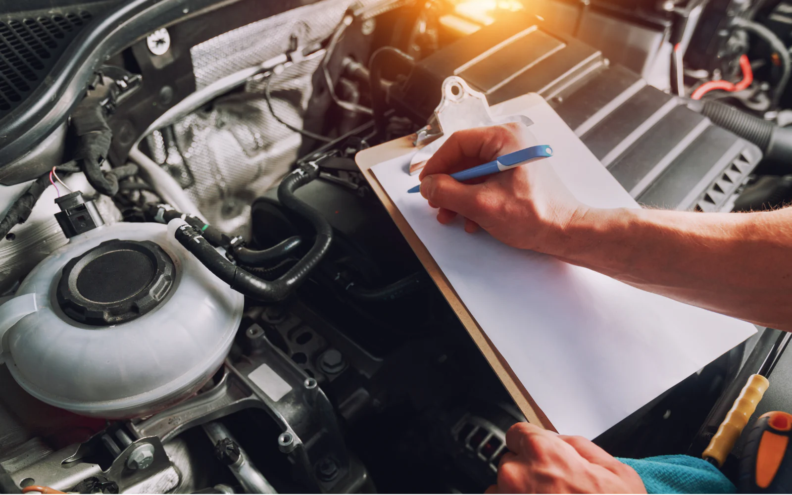 Quality and production records being reviewed on an automotive line