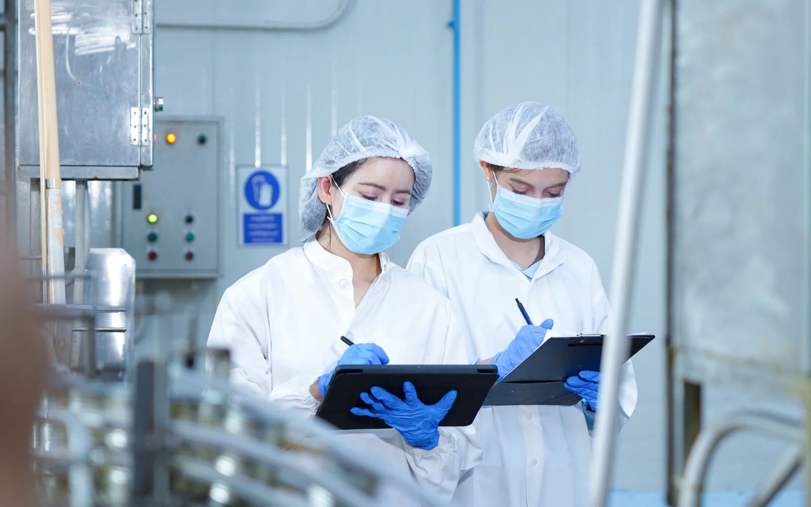 Quality and manufacturing teams reviewing regulated documentation