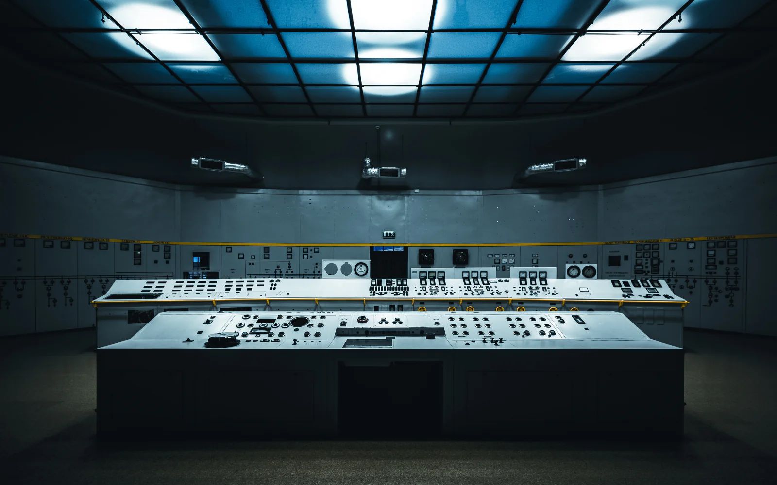 Control room operators reviewing melt-shop and mill process data
