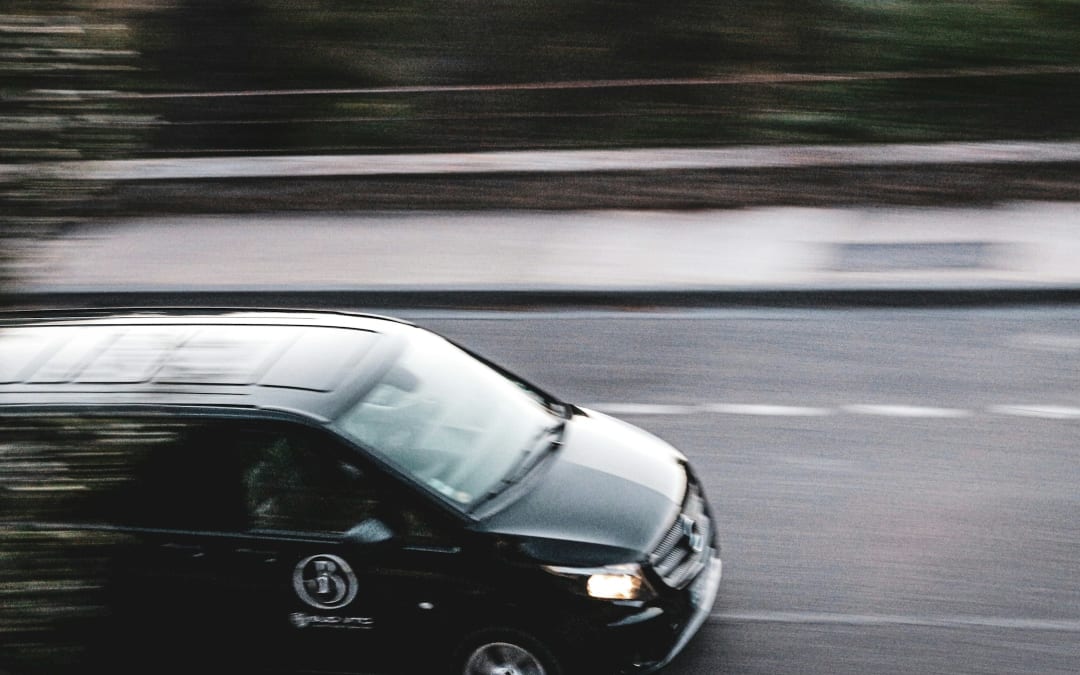Black Mercedes van on the road