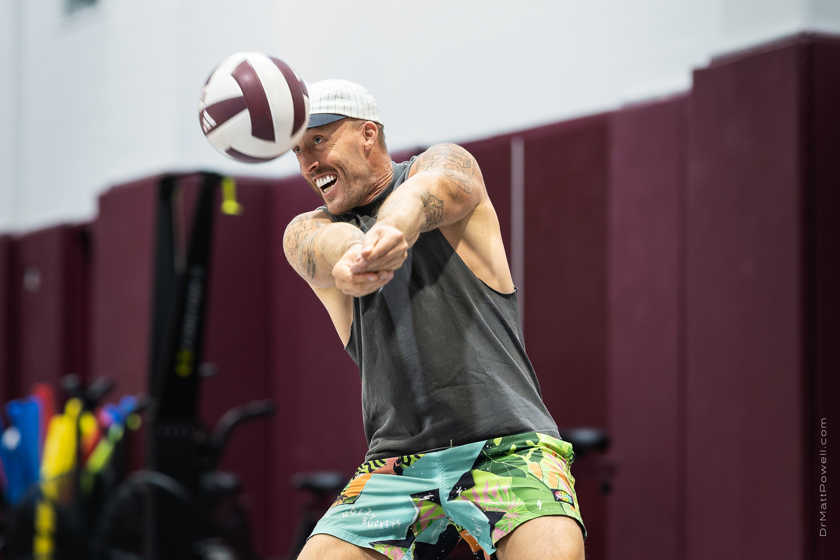 Dustin Watten passes a volleyball during the clinic in College Station.