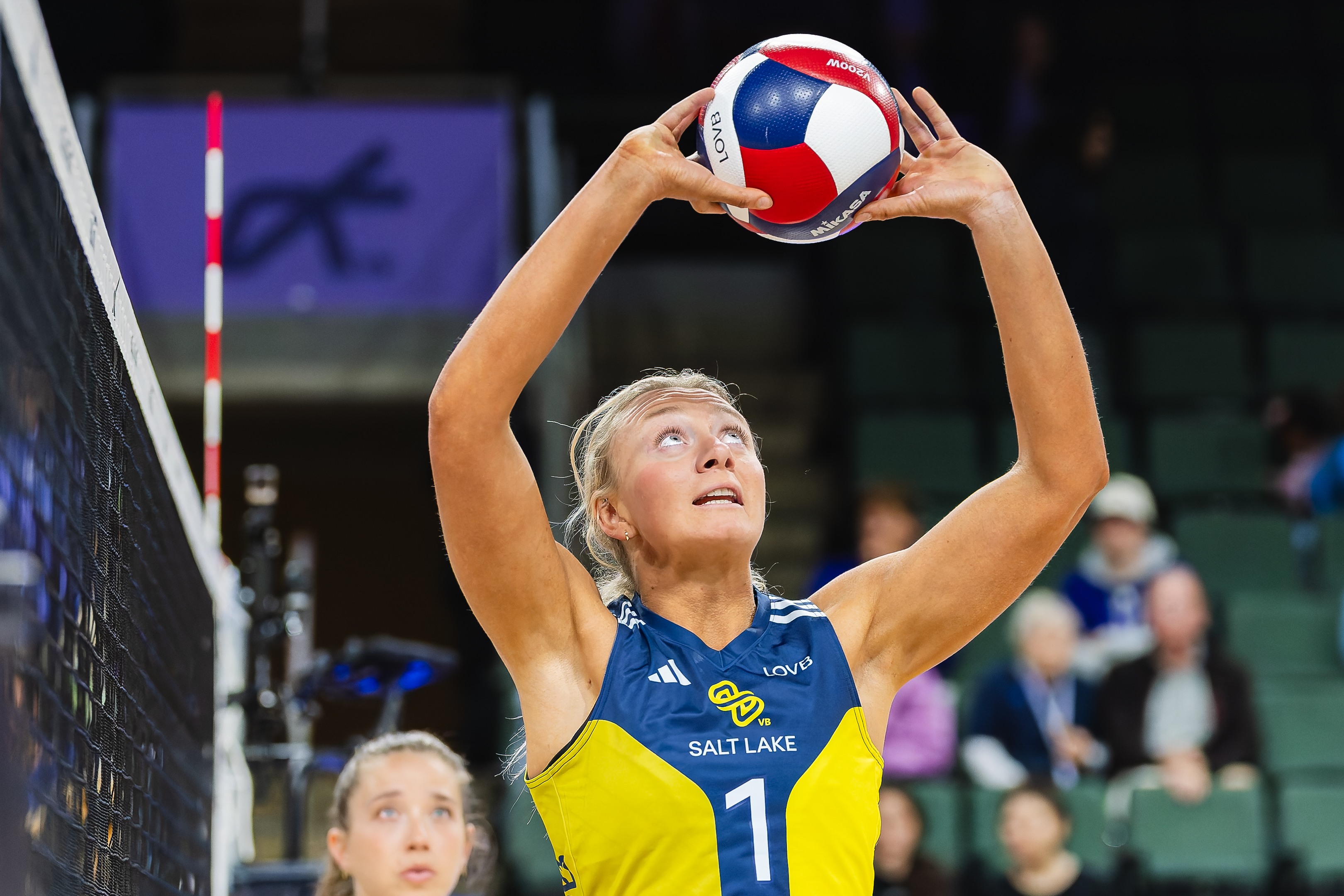 Jordyn Poulter sets for LOVB Salt Lake against LOVB Austin, April 2026. Tokyo 2020 Olympic gold medalist and returning 2026 USA Women's VNL roster member.