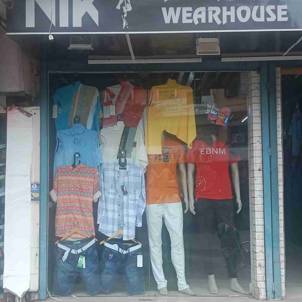 Nik fashion  logo