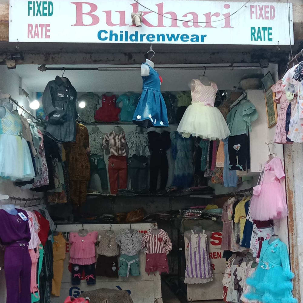 Bukhari children wear  logo