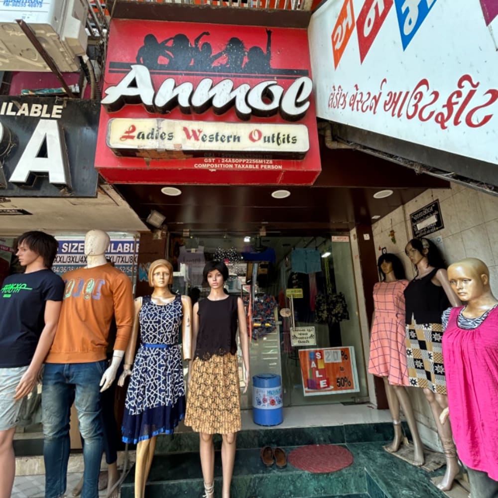 Anmol ladies western otufit logo