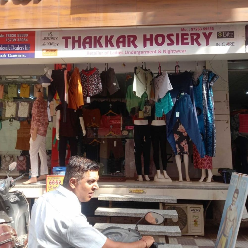 THAKKAR HOSIERY  logo