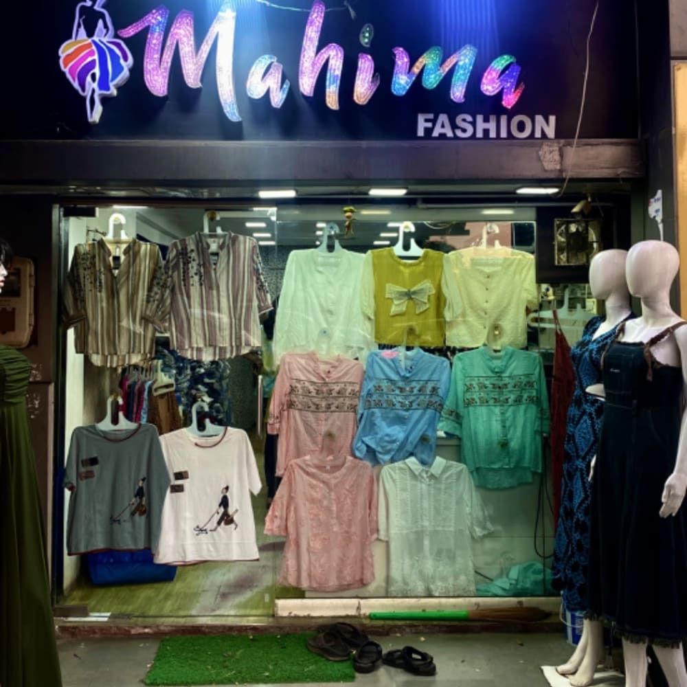 Mahima fashion  logo