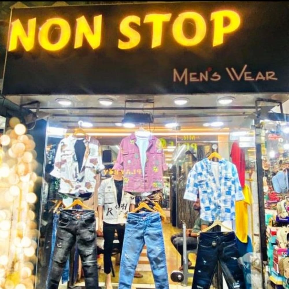 Non Stop means wear  logo
