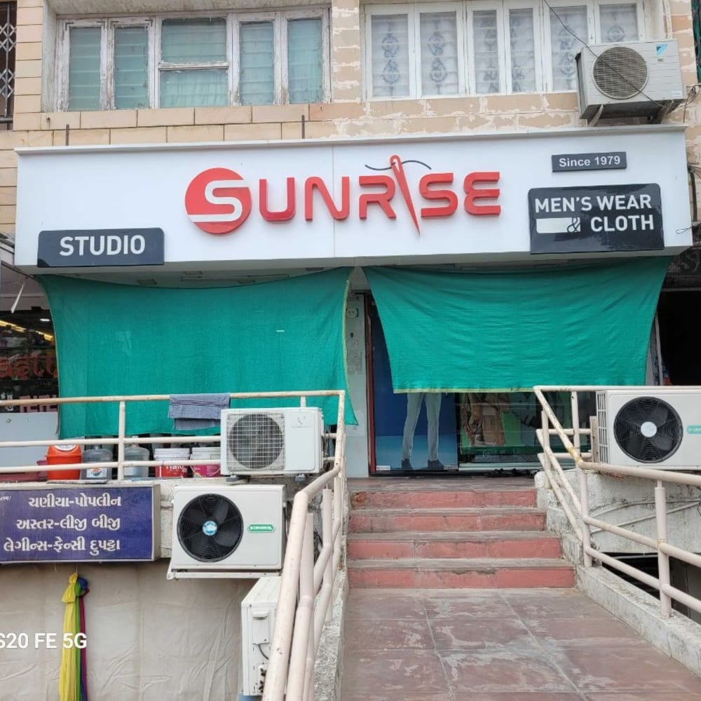 Sunrise men's wear  logo