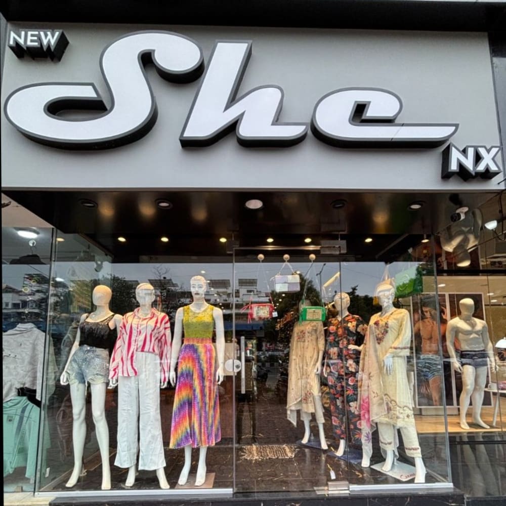 New She Nx logo