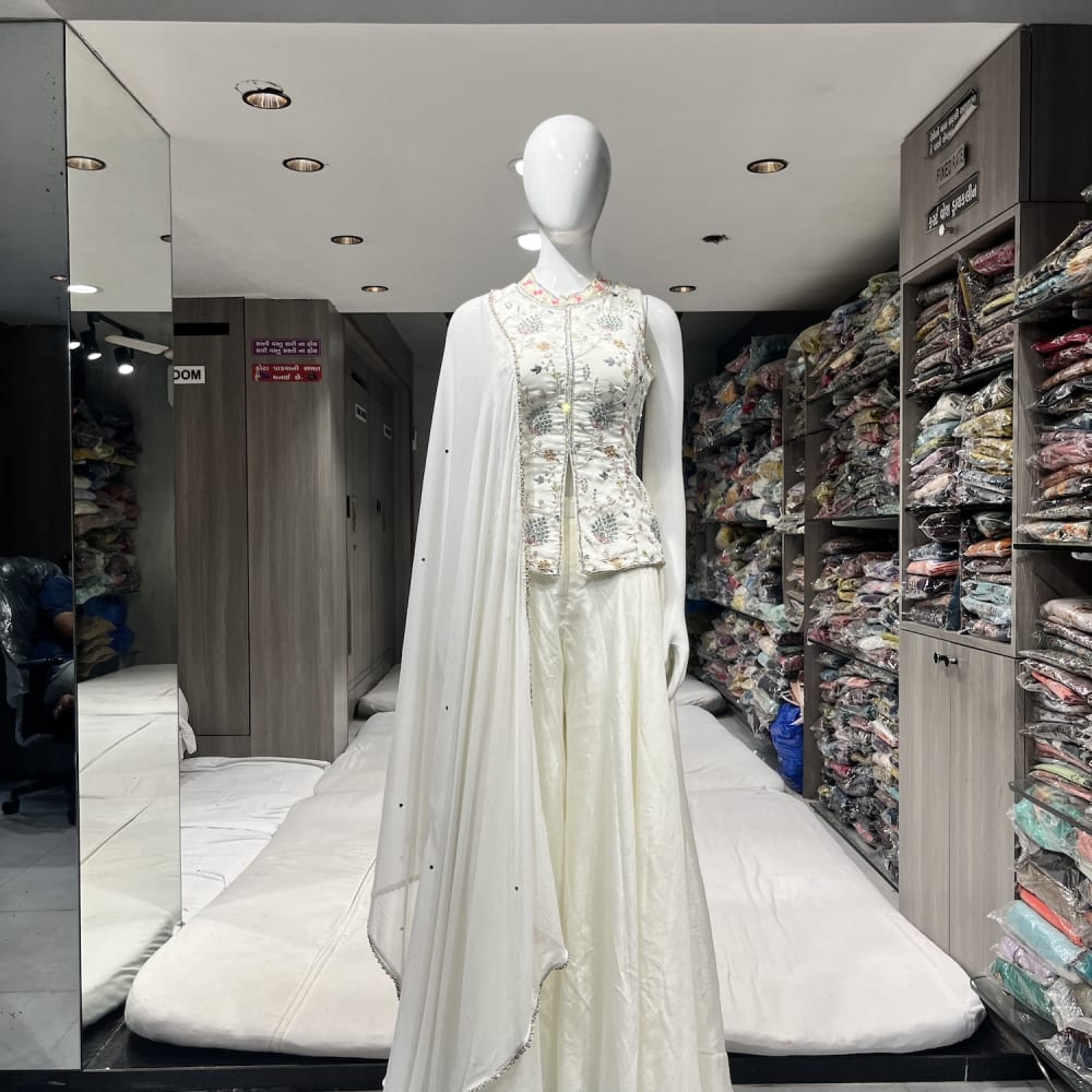 Ivory white with subtle floral accents Sharara Set