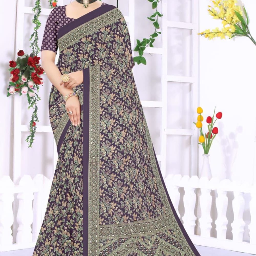 Purple, green, beige, and touches of pink. Saree