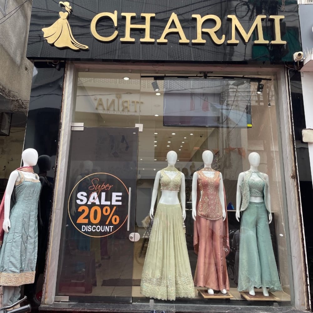 CHARMI LADIES WEAR logo