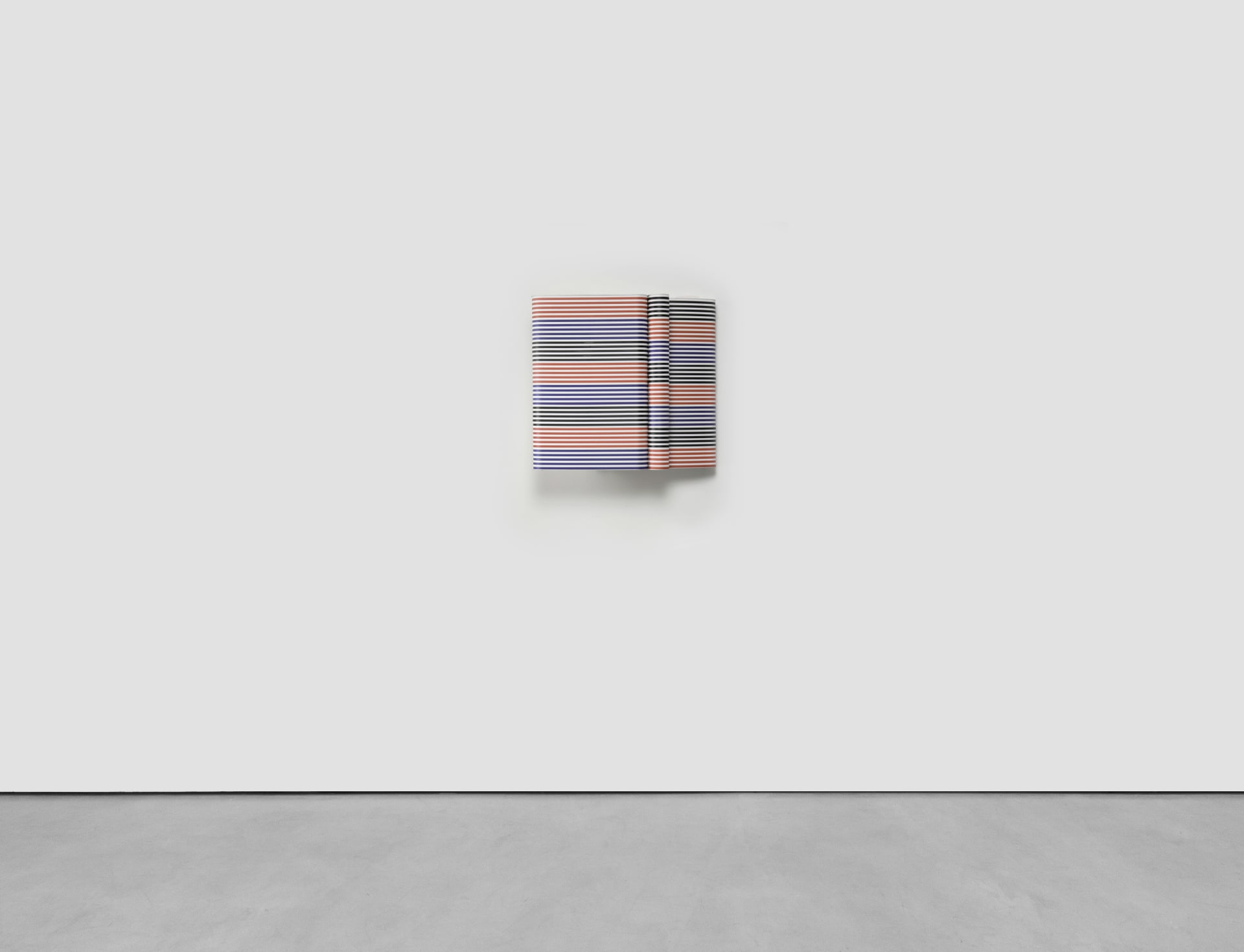 A sculptural striped wall based artwork by Jacob Dahlgren made of tessellated plastic coat hangers and aluminium. 