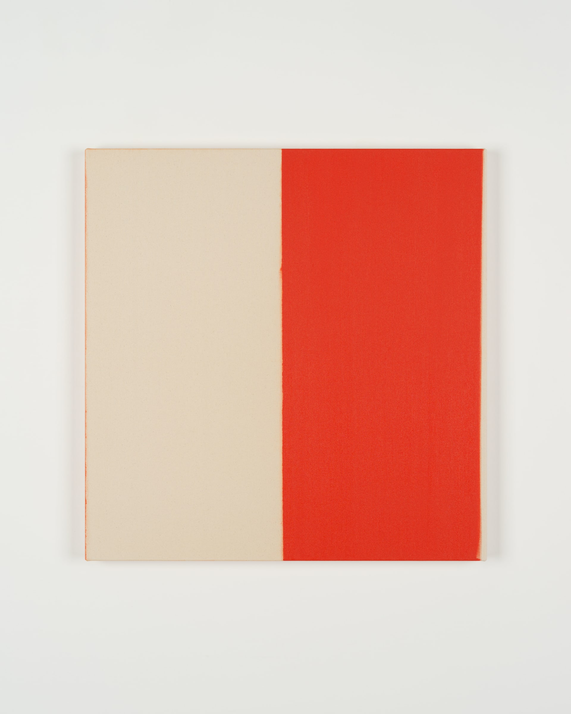 Painting by Callum Innes, one side raw canvas, the other bright orange