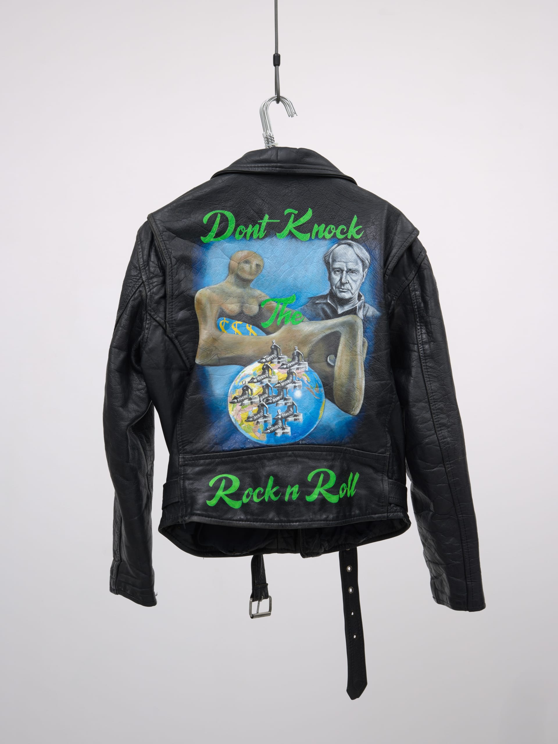 Black painted leather jacket with the text 'Don't knock the rock n roll'