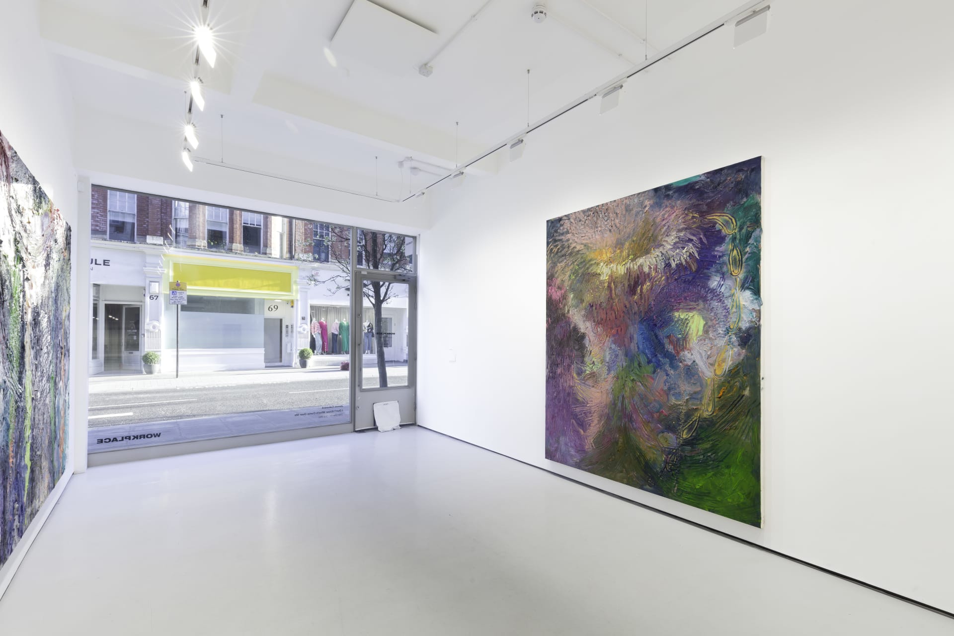 An installation view of James Cabaniuk's solo exhibition with two very large impasto oil paintings on the wall
