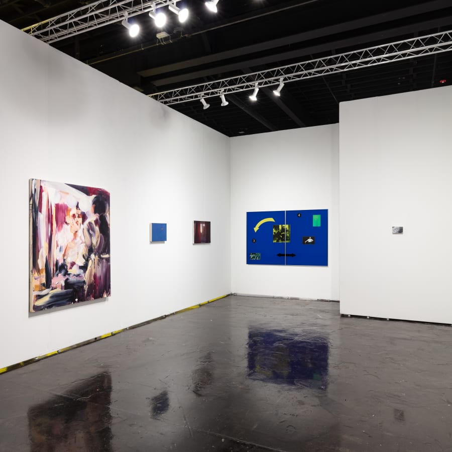 Workplace's booth at Nada Miami 2022. White walls with artworks by James Prapaithong, Simeon Barclay, Cristian Avram, Laura Lancaster, Julia Maiuri and Miko Veldkamp.
