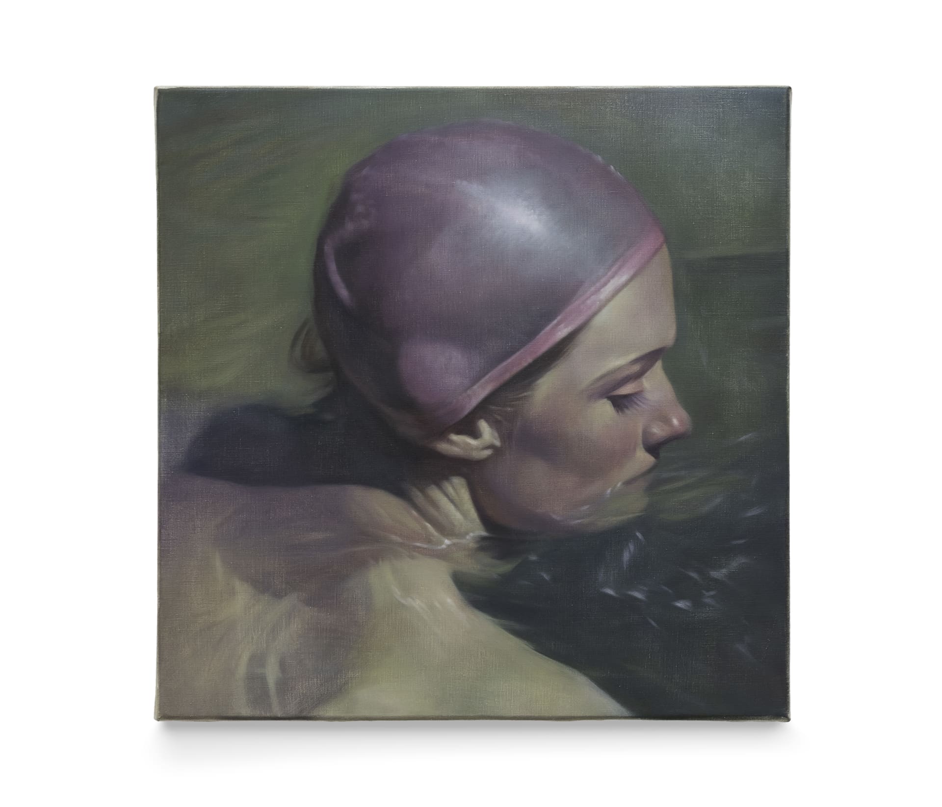 A portrait of a swimmer wearing a pink bathing hat