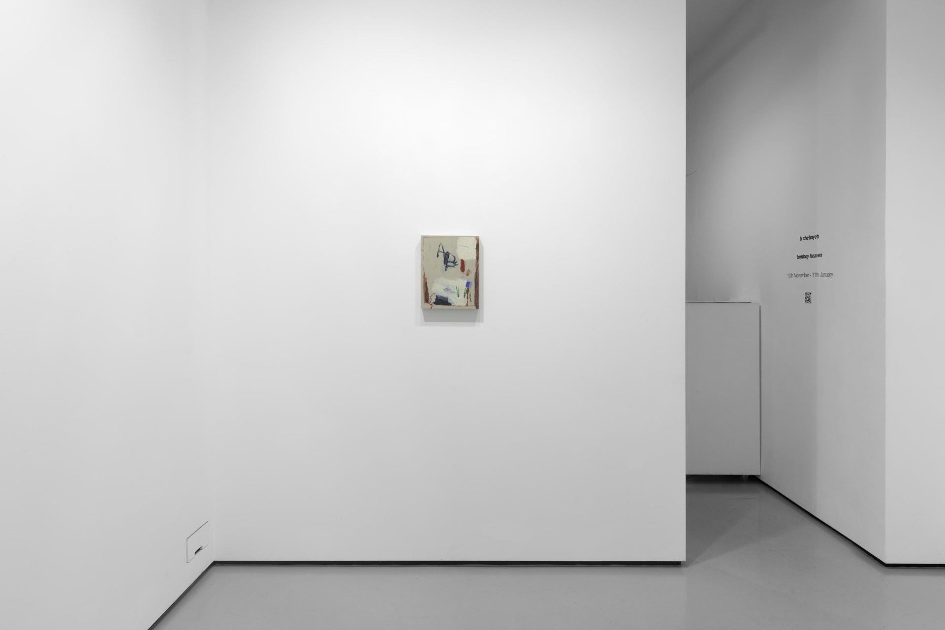 A white walled gallery with 4 artworks by b chehayeb hung on the walls