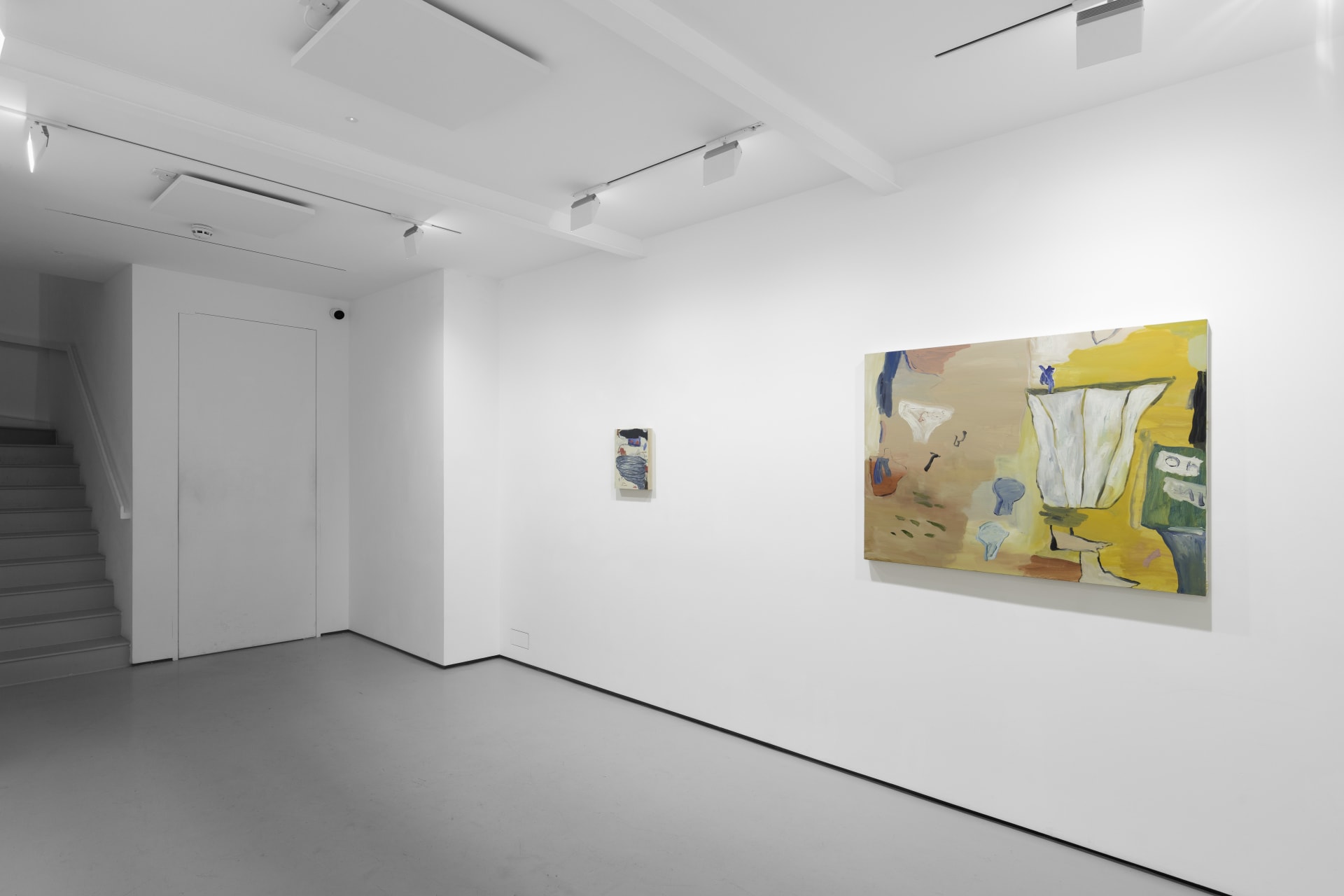 A white walled gallery with 4 artworks by b chehayeb hung on the walls