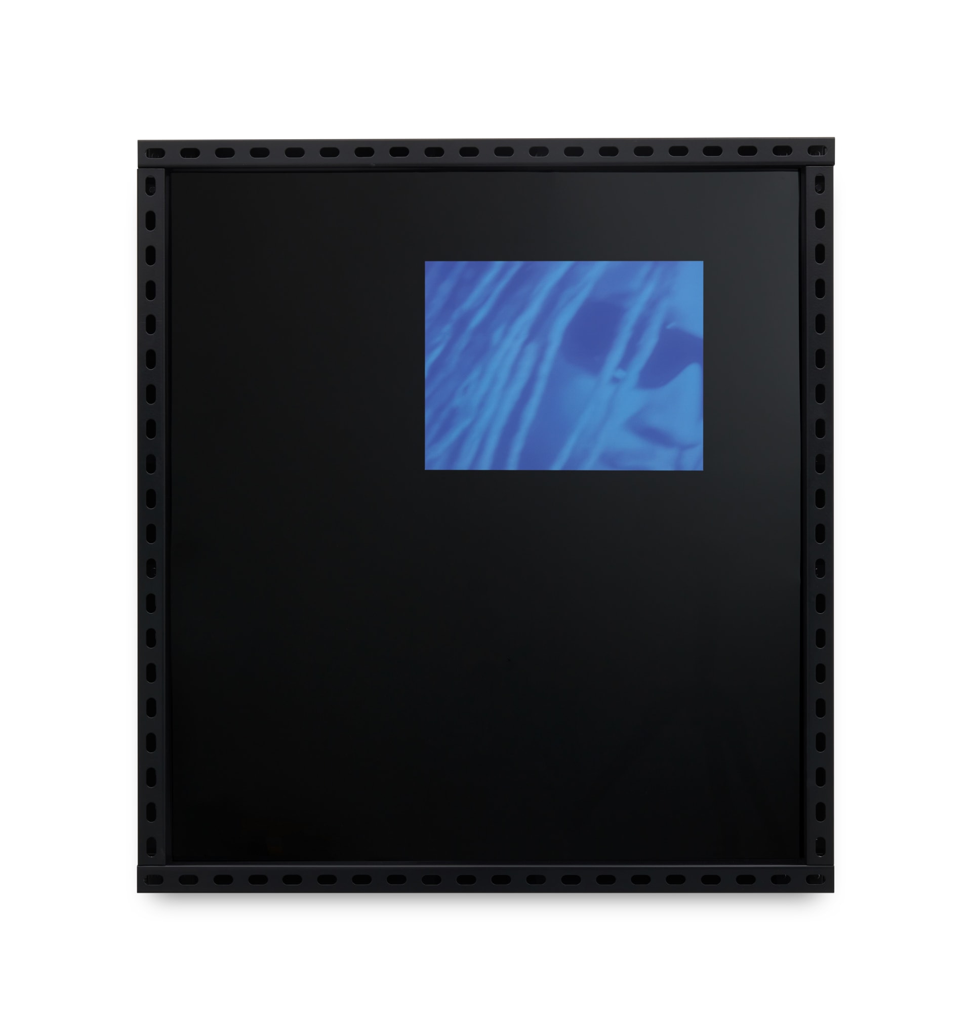 Black acrylic artwork featuring in the top right-hand corner a cropped, blue-toned image of a male face.