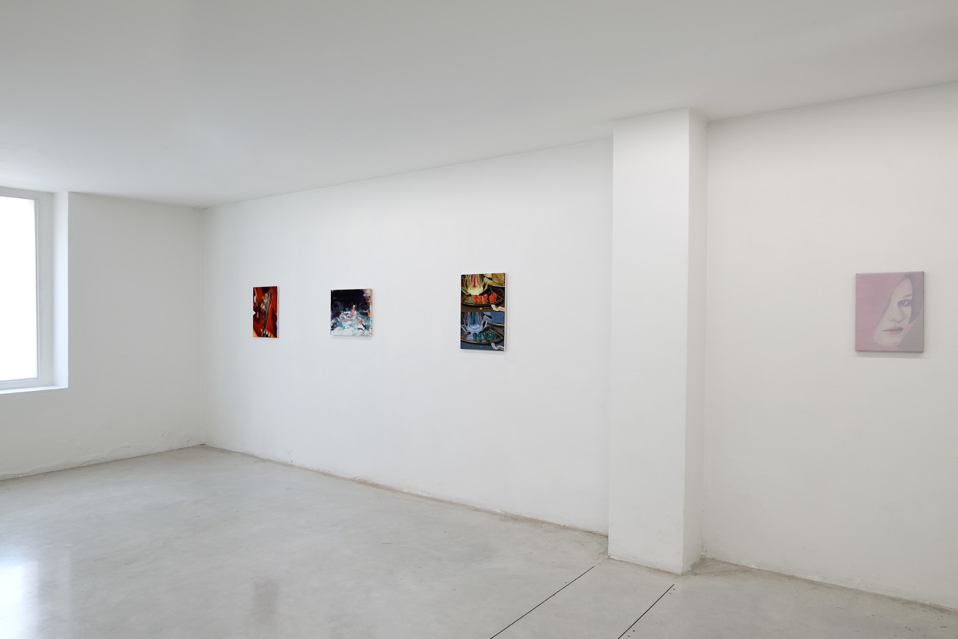 Workplace's booth at Hit! Micro Fair in Verona, Italy with paintings by Katinka Lampe, Laura Lancaster, Rachel Lancaster and Robin Megannity.