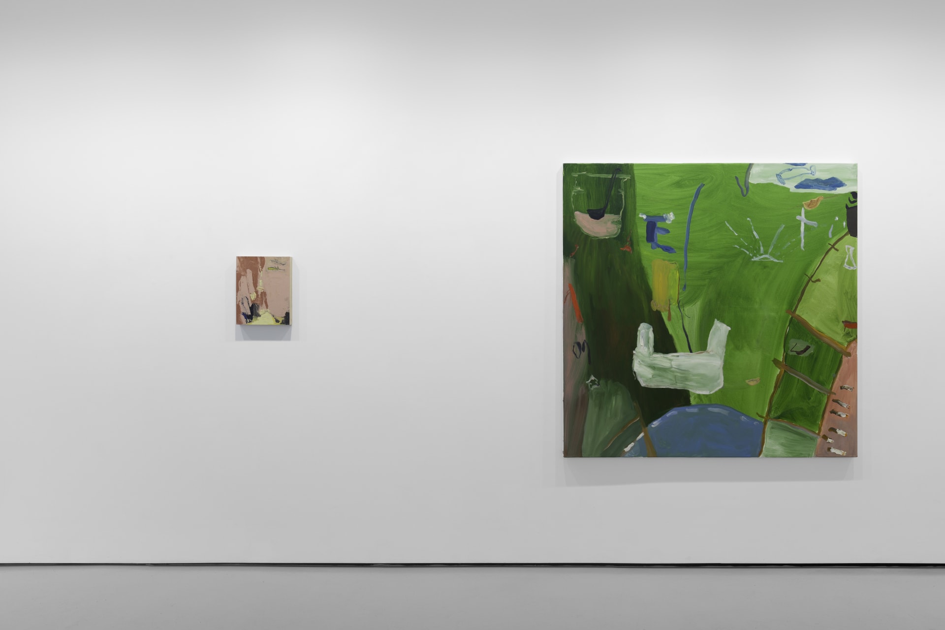 A white walled gallery with 4 artworks by b chehayeb hung on the walls