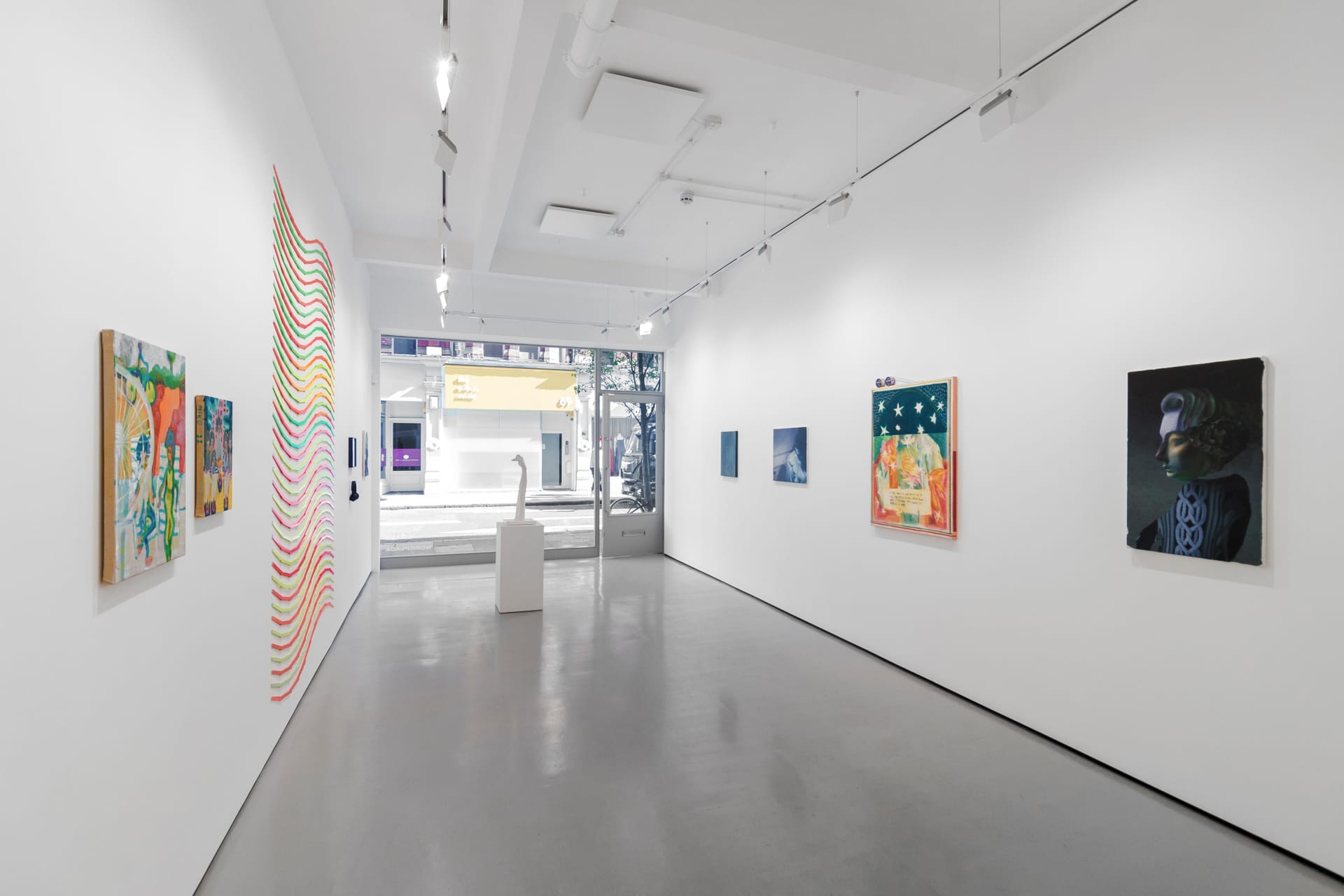 Installation views of 'Kaleidoscope' the inaugural group exhibition at Workplace in 50 Mortimer Street, Fitzrovia, London.