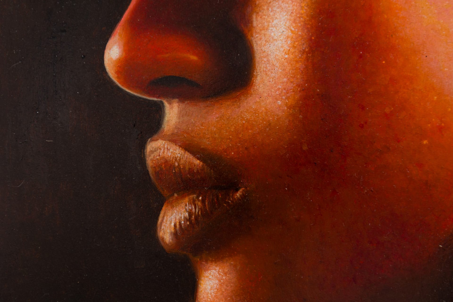 A painting by Ki Yoong of the side profile of a young man's face in a steel frame