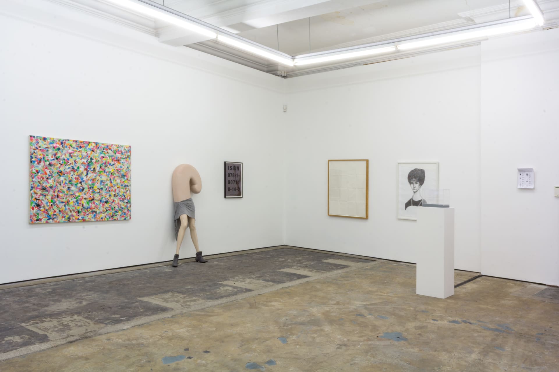 Intsallation views of The Collective at Workplace Gateshead, framed works on walls and sculpture in a white gallery space