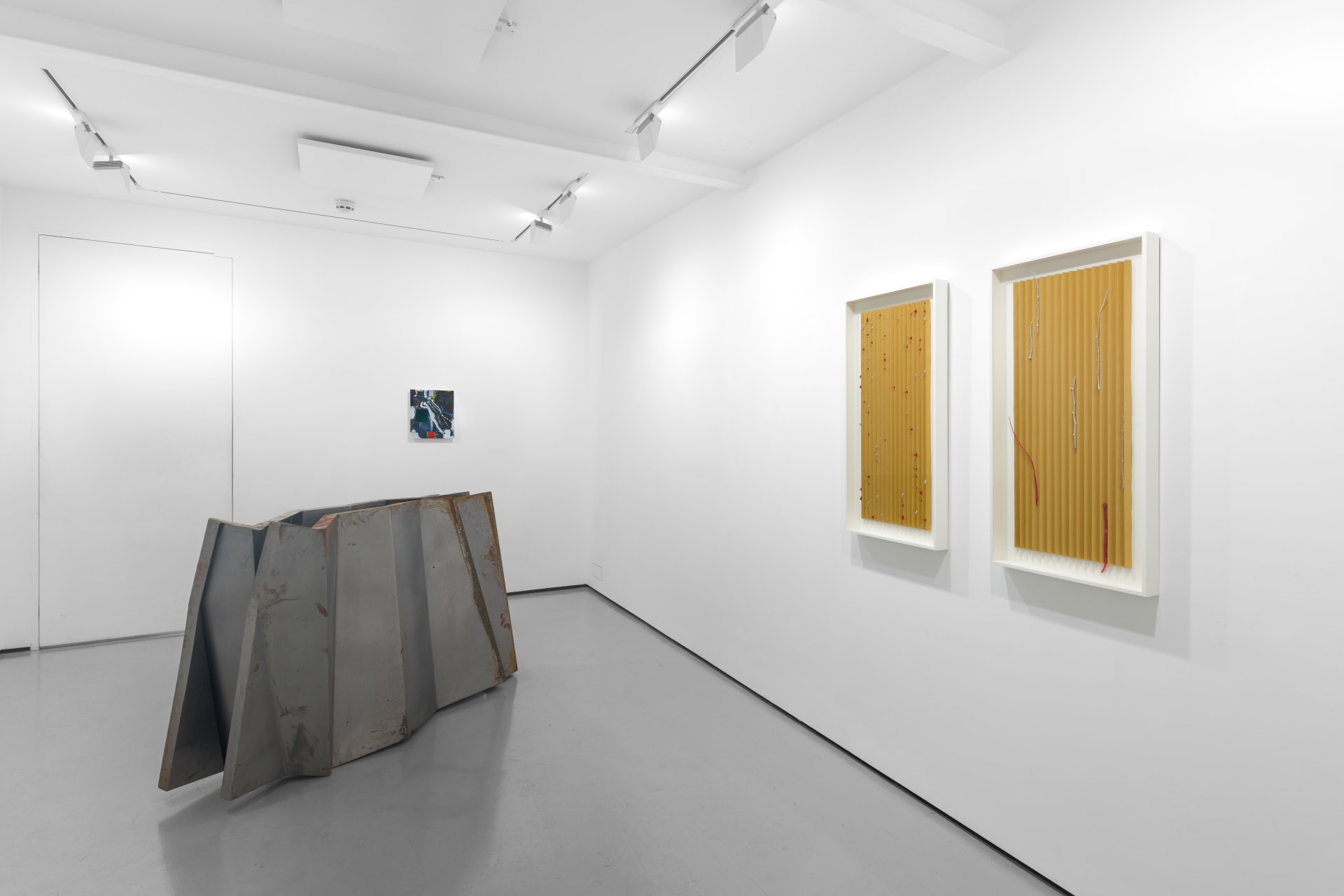 Installation view of the group exhibition Cold Feed at Workplace London including paintings and floor based sculpture