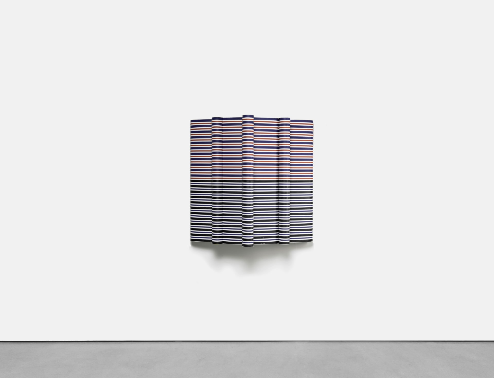 A sculptural striped wall based artwork by Jacob Dahlgren made of tessellated plastic coat hangers and aluminium. 