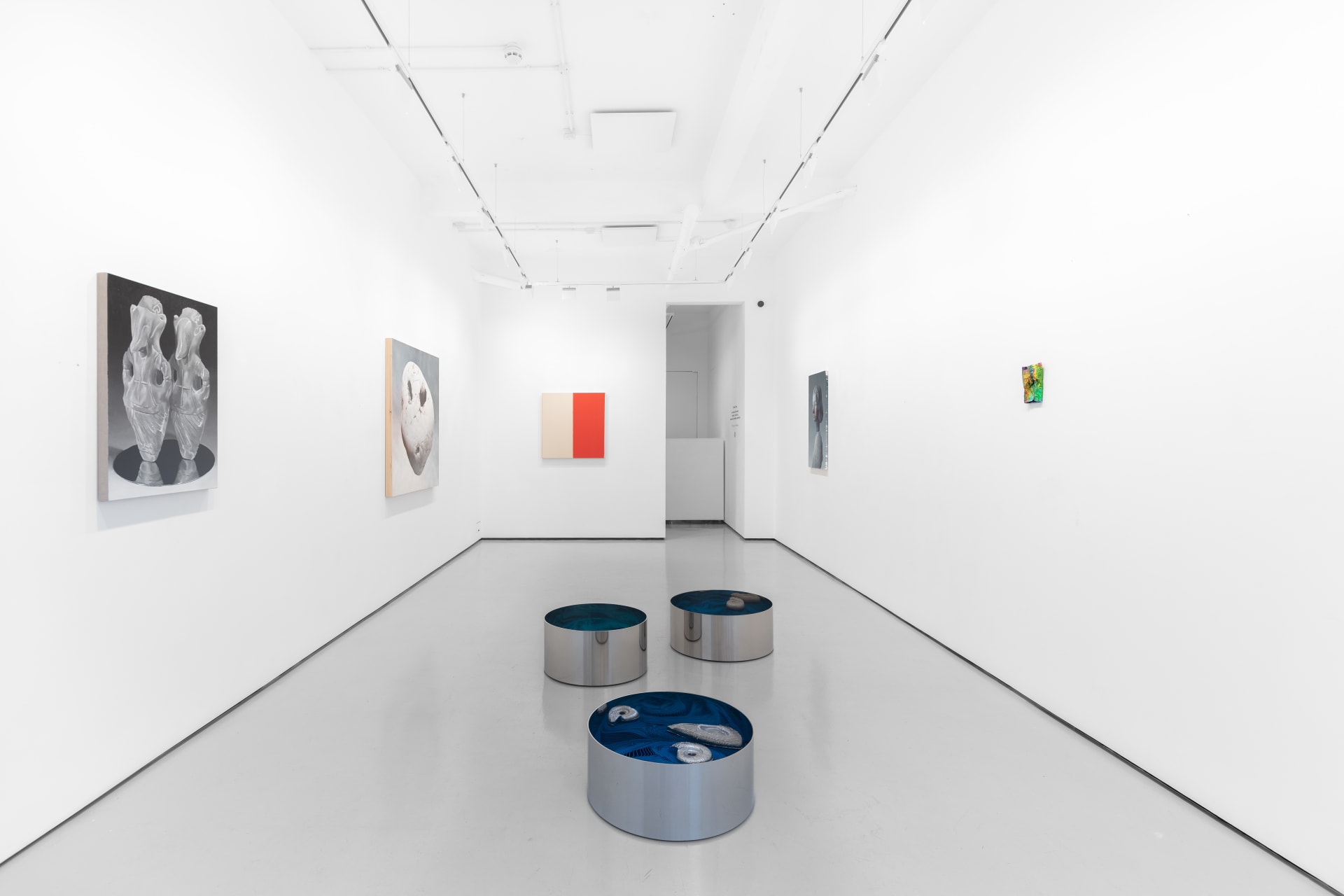 Installation view of the group exhibition Cold Feed at Workplace London including paintings and floor based sculpture