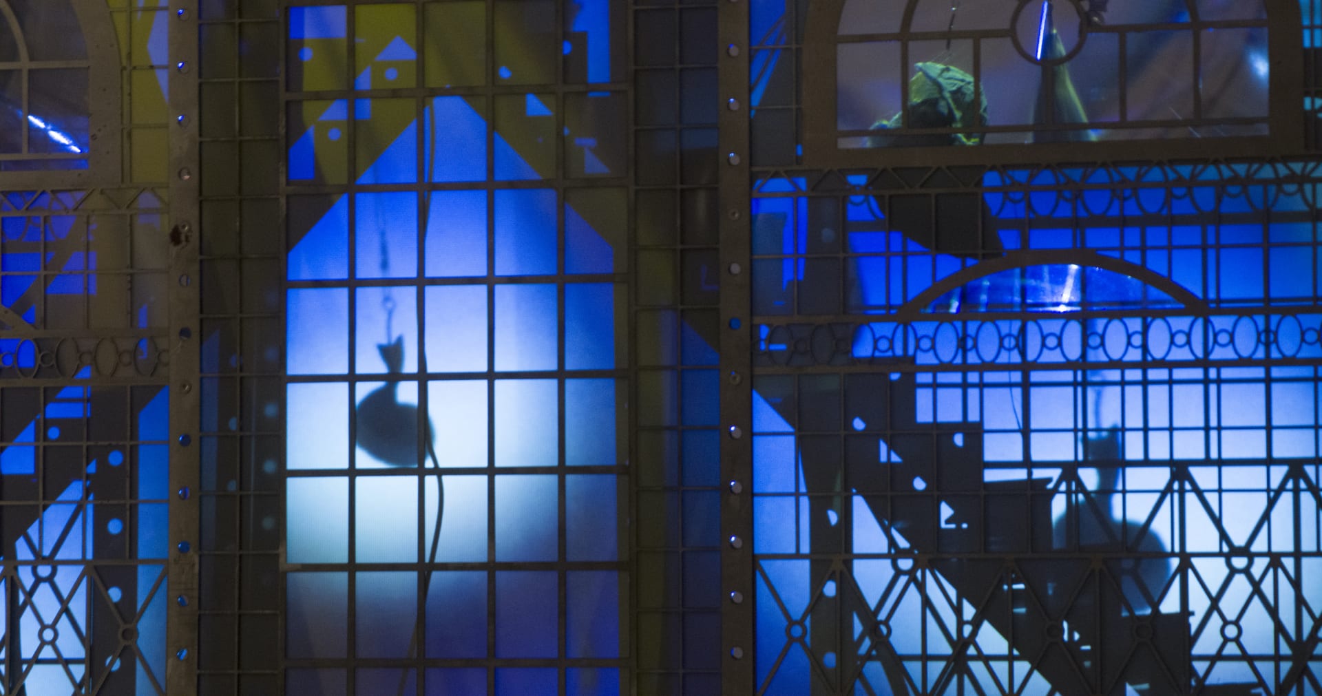 A detail of a kinetic sculpture by Hazel Brill comprised of steel, glass and lights