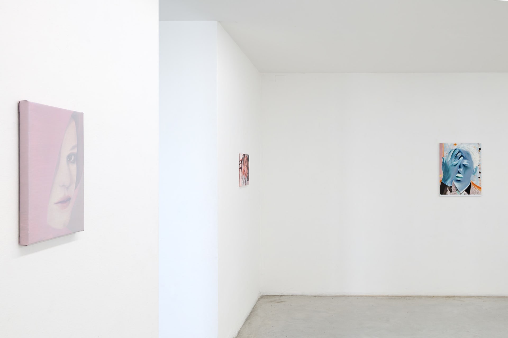 Workplace's booth at Hit! Micro Fair in Verona, Italy with paintings by Katinka Lampe, Laura Lancaster, Rachel Lancaster and Robin Megannity.