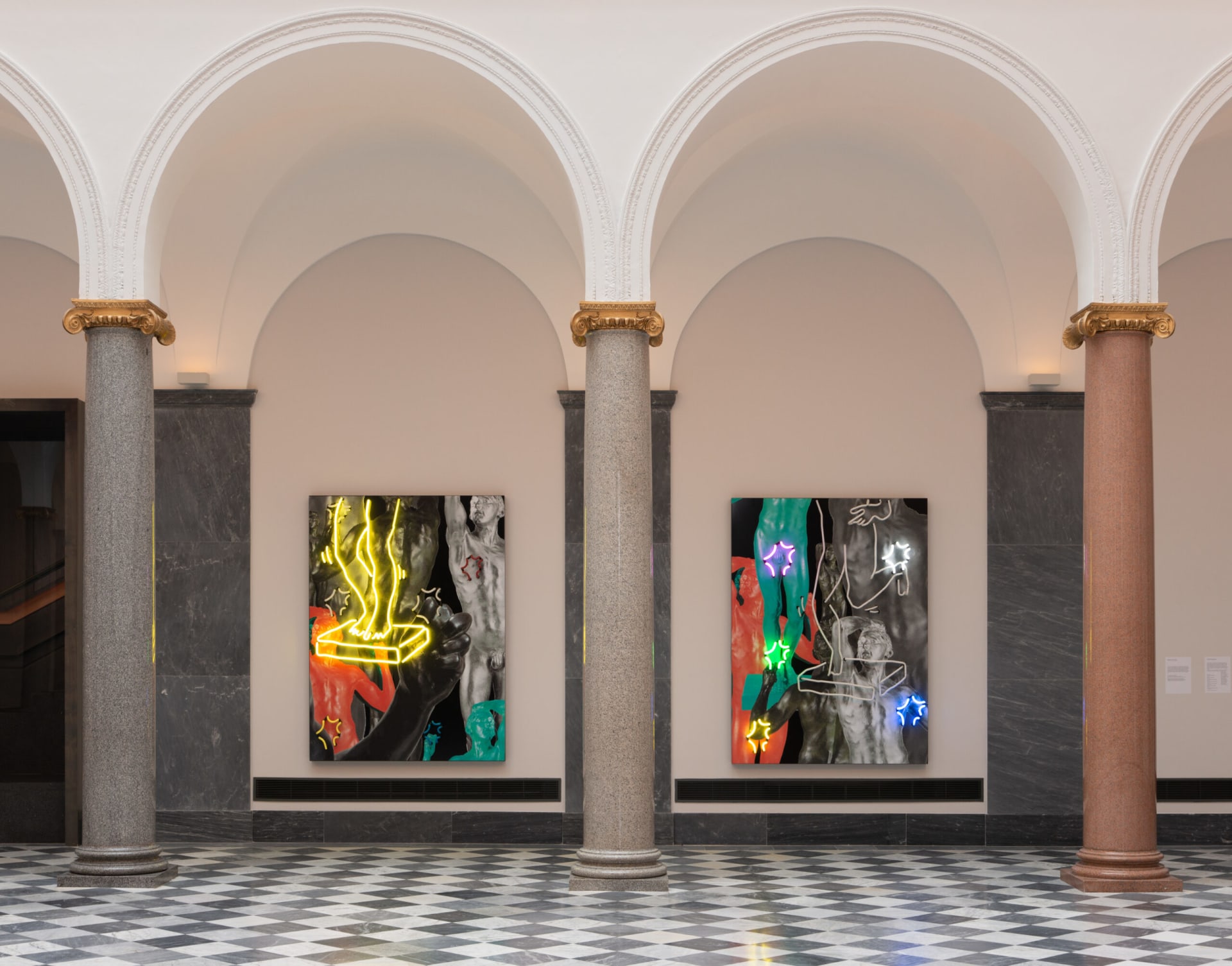 Two wall based works with photography and neon by Simeon Barclay installed in two alcoves 