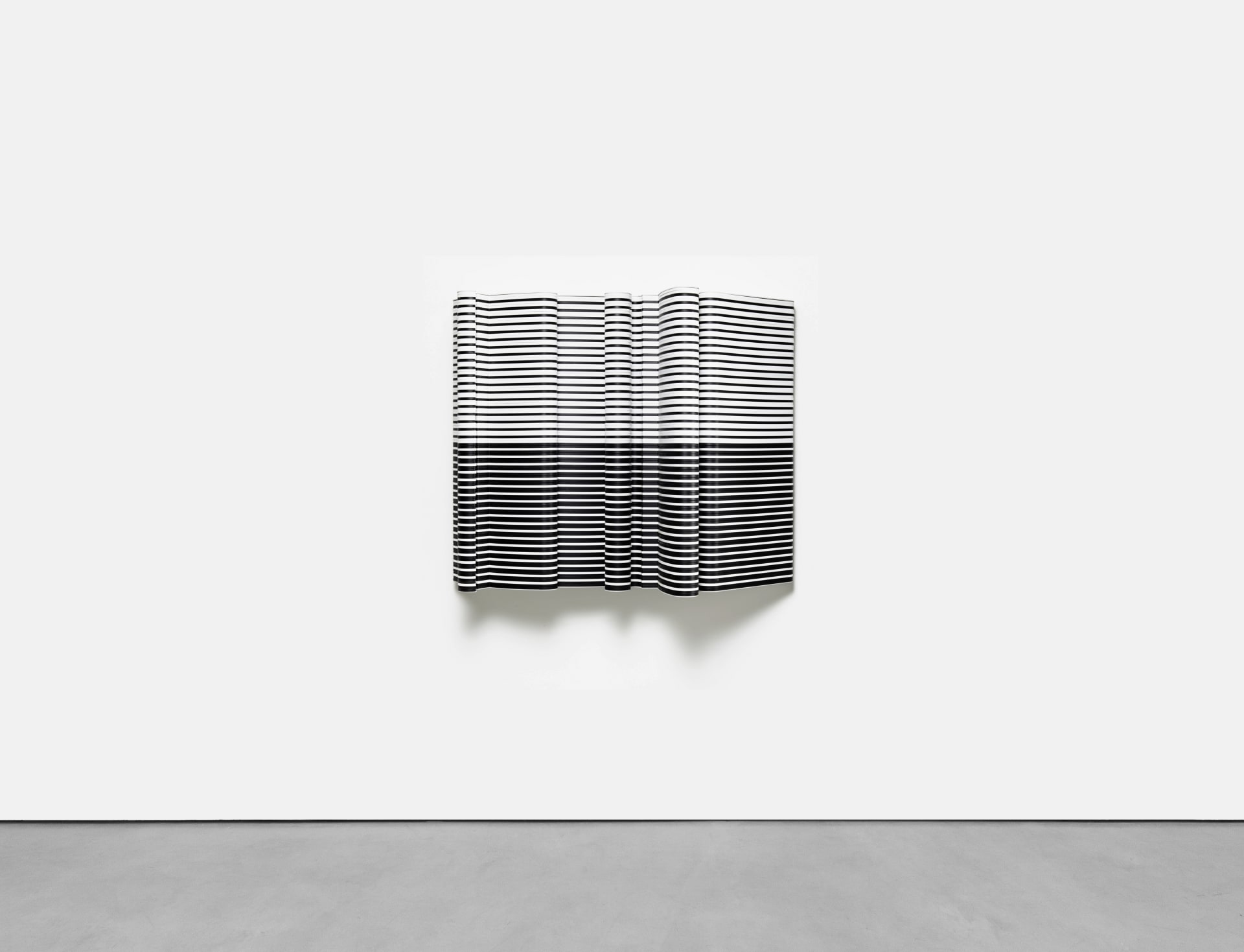 A sculptural striped wall based artwork by Jacob Dahlgren made of tessellated plastic coat hangers and aluminium. 