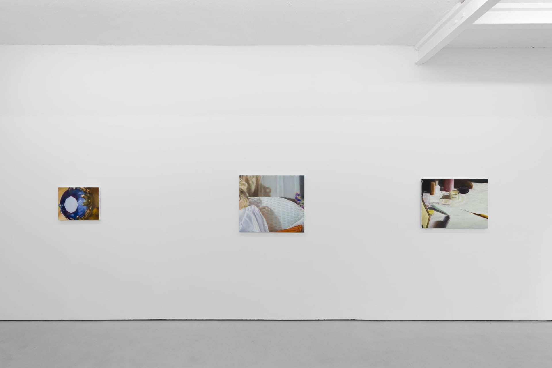 Rachel Lancaster's medium scale oil paintings of domestic objects from cinema are hung in a spacious white gallery space