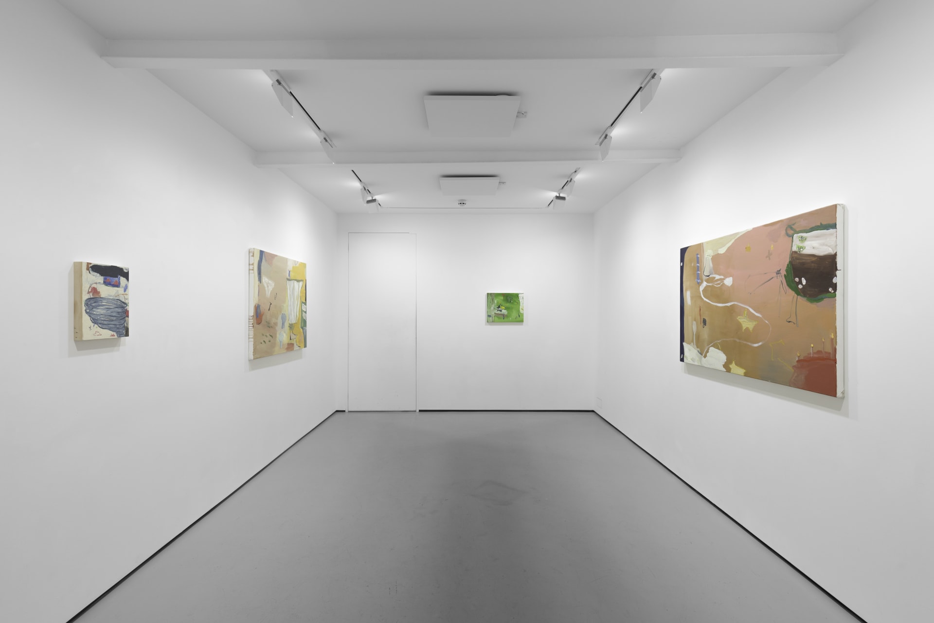 A white walled gallery with 4 artworks by b chehayeb hung on the walls