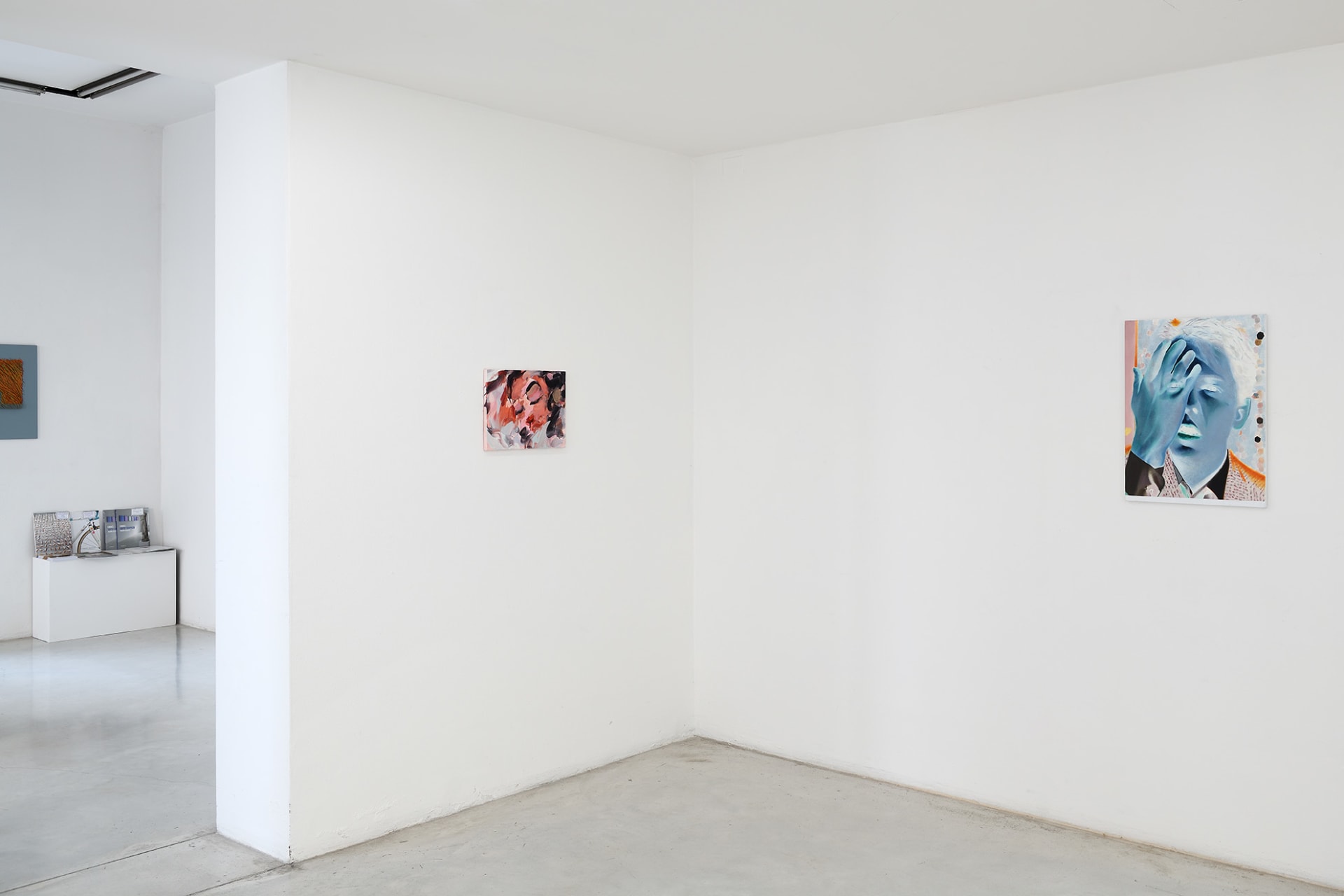 Workplace's booth at Hit! Micro Fair in Verona, Italy with paintings by Katinka Lampe, Laura Lancaster, Rachel Lancaster and Robin Megannity.