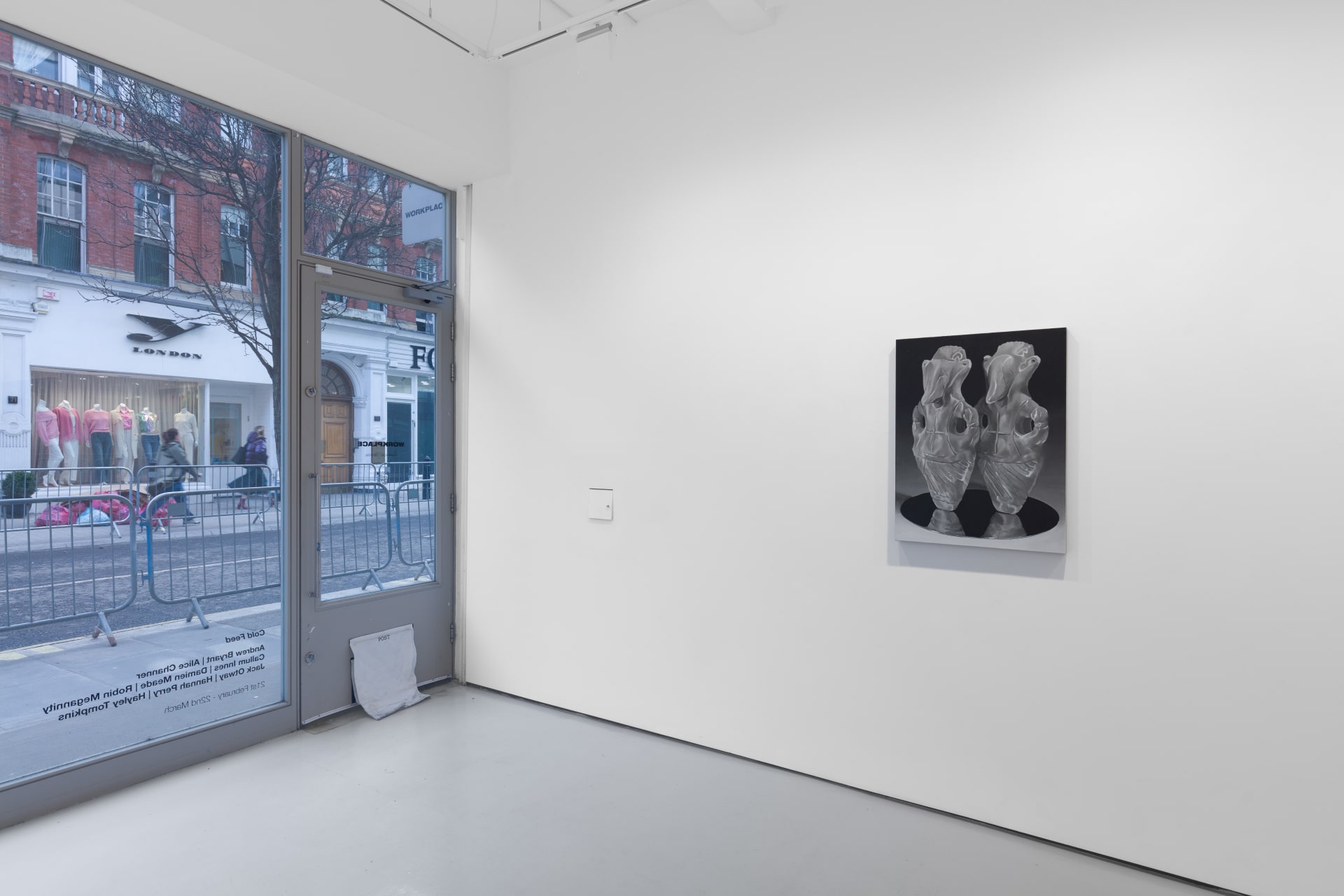 Installation view of the group exhibition Cold Feed at Workplace London including paintings and floor based sculpture