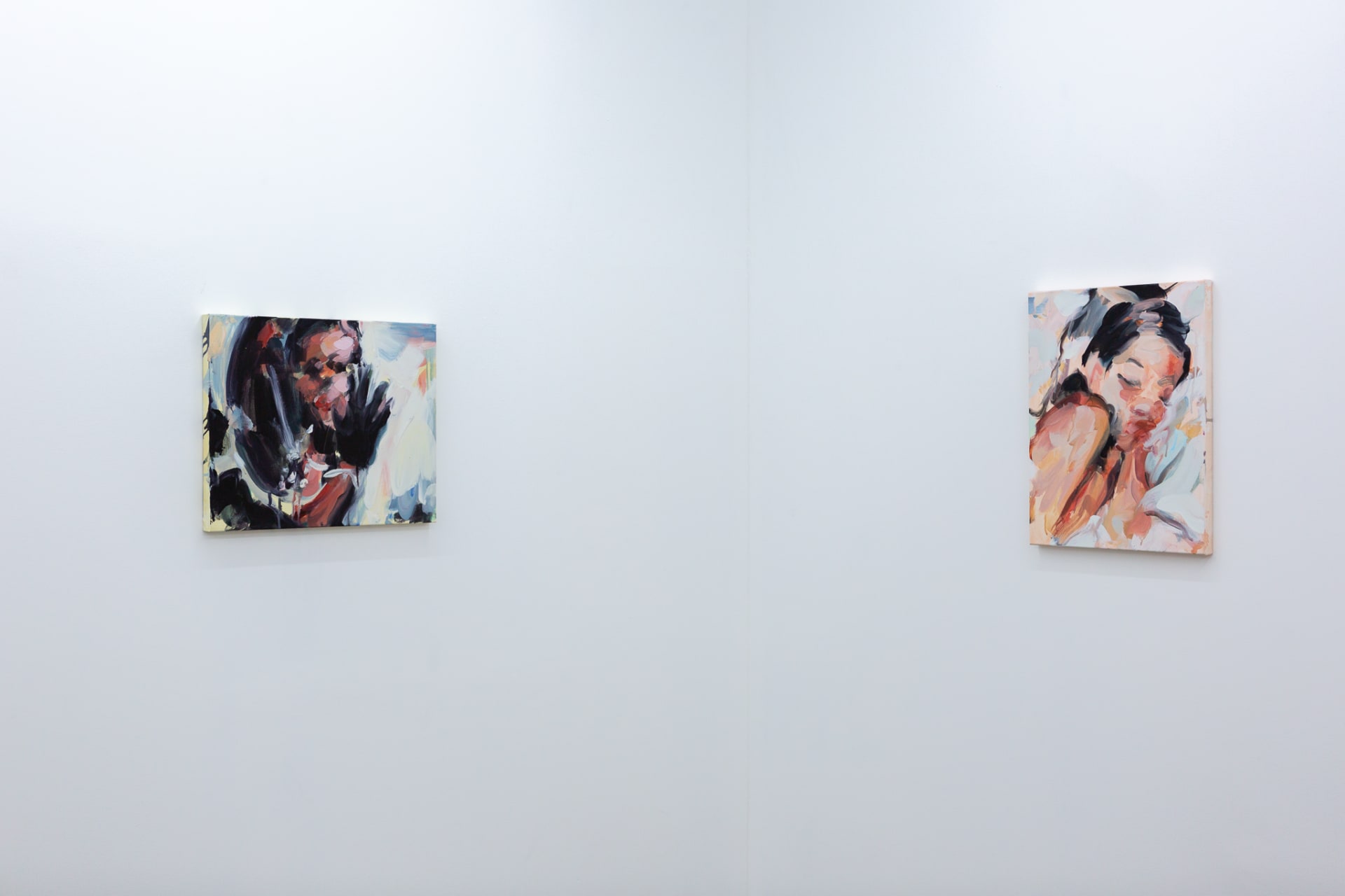 Installation shots of Laura Lancaster's solo show at Workplace London. Close up crop paintings of sleeping women and figures in landscapes, loosely painted.