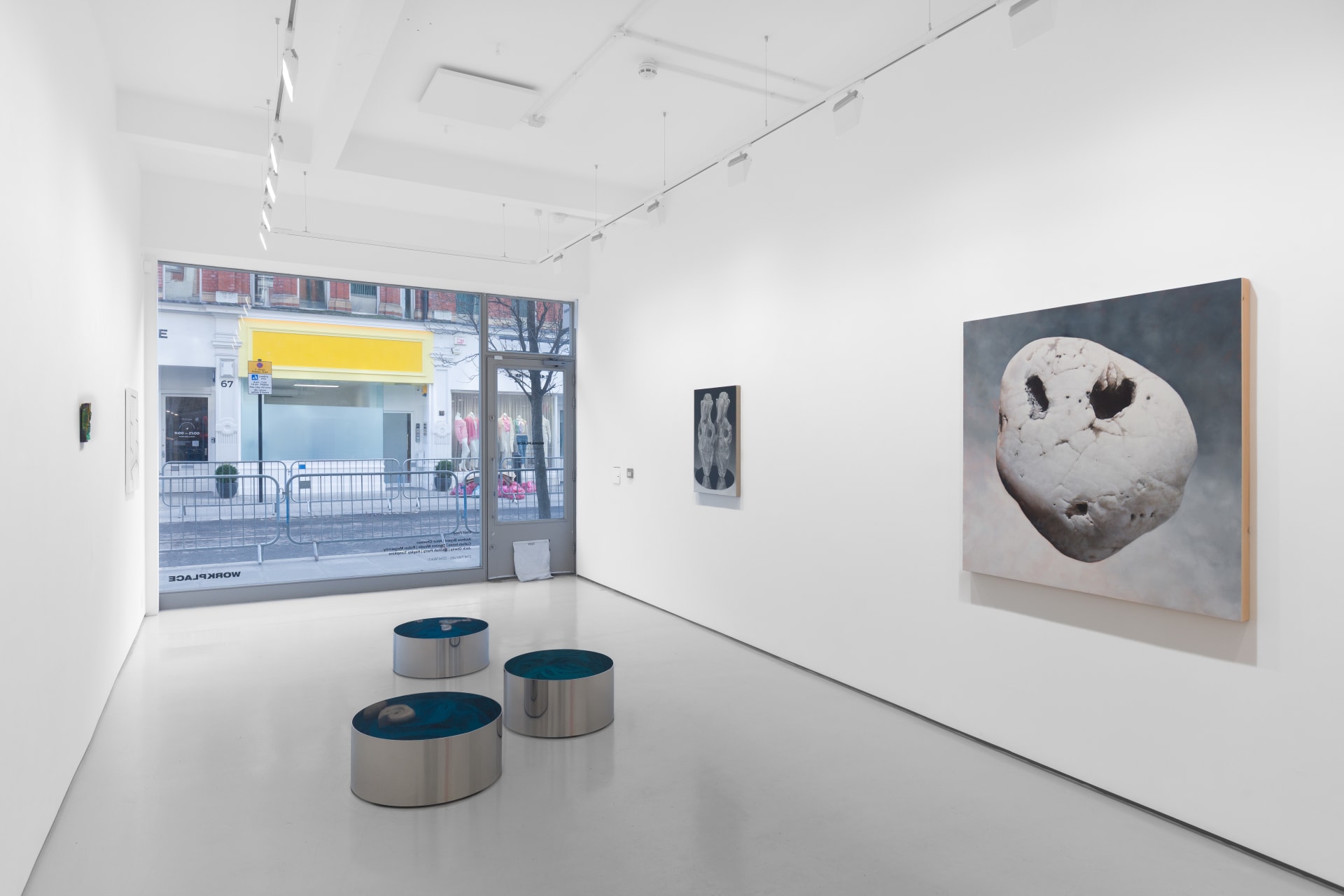 Installation view of the group exhibition Cold Feed at Workplace London including paintings and floor based sculpture