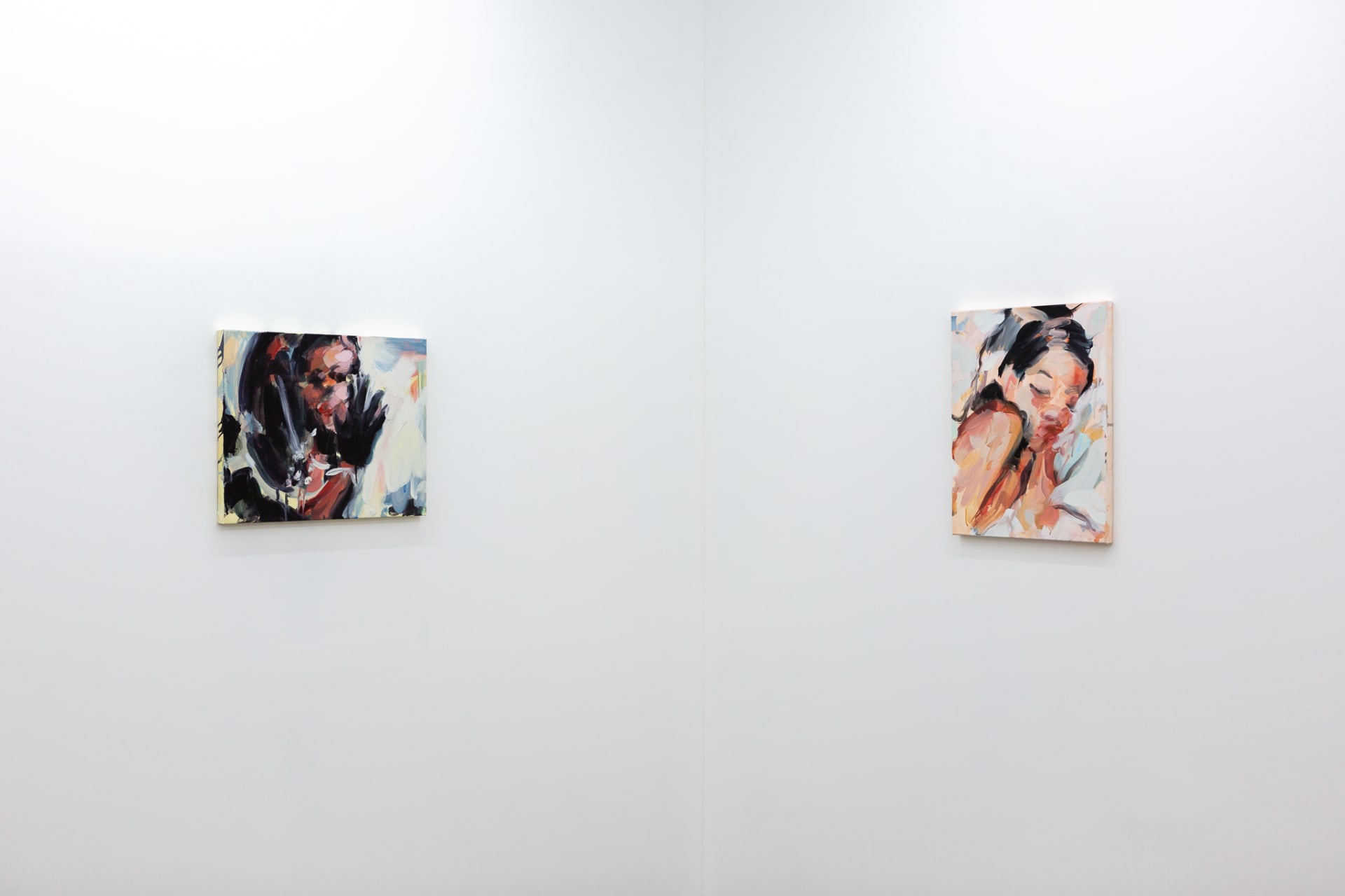 Installation shots of Laura Lancaster's solo show at Workplace London. Close up crop paintings of sleeping women and figures in landscapes, loosely painted.