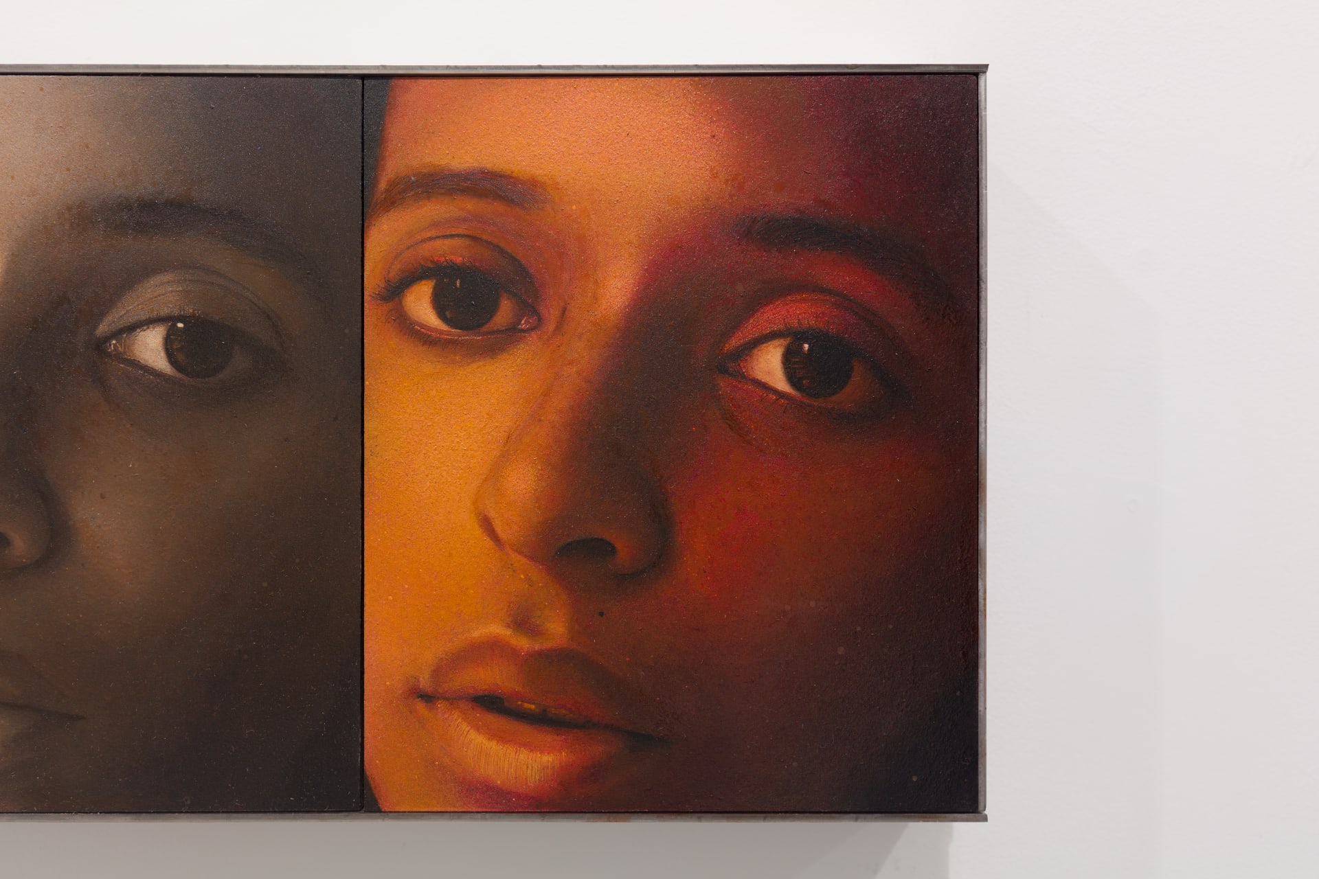 A diptych painting by Ki Yoong of two almost identical portraits of a young woman side by side